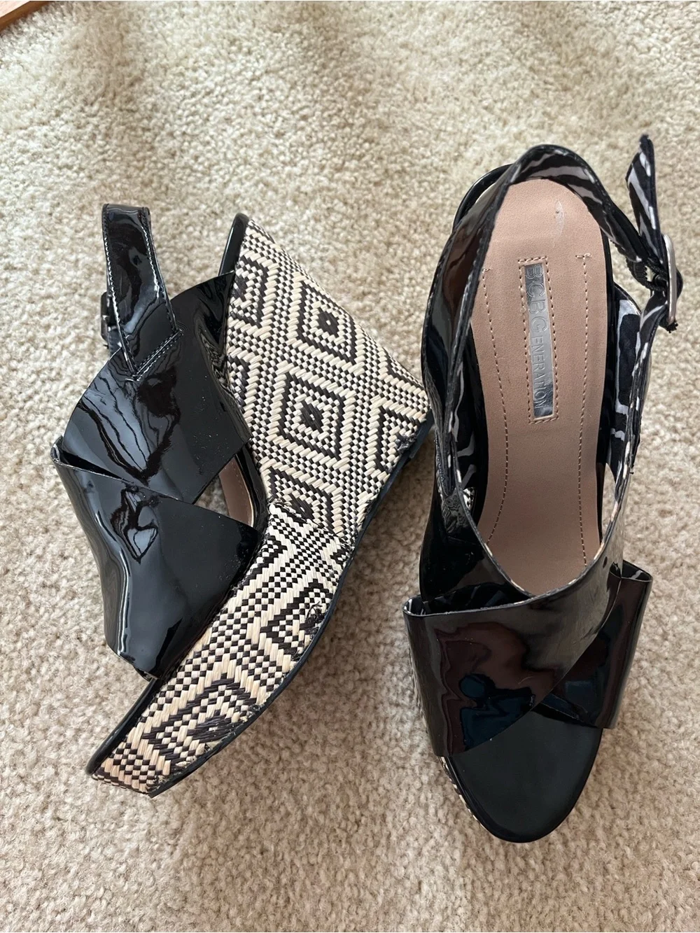 BCBGeneration Patent Black Wedge Sandals with Patterned Straw Platform